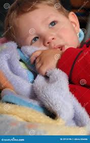 Snuggling Blankie stock photo. Image of baby, blanket