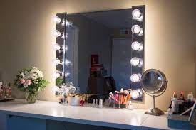 When you purchase the mirror have the glass shop cut it to your specifications. Glam Diy Light Up Vanity Mirror Projects Ohmeohmy Blog