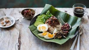 Dengan kopi o dan air kosong. 5 Fakta Unik Seputar Nasi Lemak Khas Malaysia Sajikan Dengan Daun Pisang Halaman All Tribun Batam
