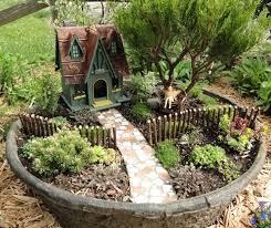 Miniature gardens in mason jars or fish bowls will look charming displayed throughout your home, while outdoor arrangements could be created in an unused bird feeder, wheelbarrow or even a pair of rubber gardening boots.6 x research source. Miniature Garden Center Home Of Two Green Thumbs Fairy Garden Houses Fairy Garden Miniature Garden