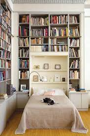 A minimal wall display in which the tv is the main focus of the room and is either surrounded by only a few tiny objects or by nothing at all is a great way to hang your tv on the wall without creating a distracting display. 9 Bedrooms With Endless Bookshelves For Book Lovers