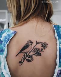 The bird sits on the branch in the background of the target, which symbolizes. Small Birds On Branch Tattoo Tattoo Design