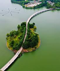 An ait or eyot is a small island. Aits are typically formed by the deposit of sediment in the water, which accumulates. ... A channel with numerous aits is called a braided .