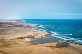 The skeleton coast is the coastline of namibia that runs north from the swakop river in swakopmund to the kuene river on the angolan border. Namibia Safari Dunes Skeleton Coast Art Of Safari