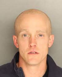 Two arrested, charged with making meth near their children