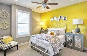 This beautiful bedroom with the cool bed and grey exposed brick walls makes for a fresh bedroom that not only looks modern but also really. Bedroom With Grey Wall And Furniture With An Accent Yellow Wall In 2021 Yellow Bedroom Decor Girls Bedroom Colors Yellow Bedroom Walls