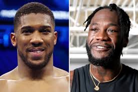 Anthony Joshua vs Deontay Wilder fight could be confirmed in next TWO weeks  as Eddie Hearn says 'we're all in'