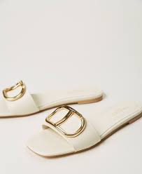 From the backcountry to the job site (and maybe a night out in between) we've got you covered with premium materials, breathable waterproofing. Leather Sliders With Logo Woman White Twinset Milano