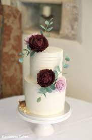 2 Tier Buttercreamed Cake With Sugarpaste Peonies And Roses Eucalyptus And Naugh Burgundy Wedding Cake Wedding Cake Burgundy Flowers Wedding Anniversary Cakes