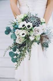 Peacock feathers are said to bring good luck and harmony, and it has become the hottest trend for weddings. 29 Teal Bouquet Ideas Bouquet Wedding Flowers Flowers Bouquet