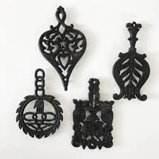Four Vintage Cast Iron Trivetshot Plateswall Etsy Plate Wall Decor Scandinavian Decor Boho Decor