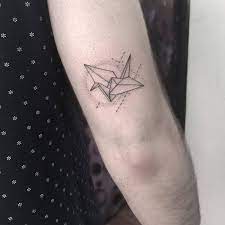Maybe you would like to learn more about one of these? 26 Gorgeous Paper Crane Tattoos And Meanings Page 2 Of 2 Tattoobloq Paper Crane Tattoo Tattoos Hand Tattoos