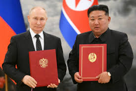 Russia and North Korea sign partnership deal as Kim pledges 'full support'  for Putin's Ukraine war