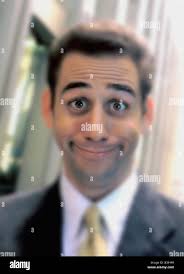 Makes funny faces hi-res stock photography and images