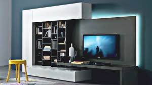 Yes, you can make that hulking black box easier on the eyes. Modern Tv Wall Units Wall Decoration With Tv Modern Living Room In Lovely Modern Living Room Tv Wall Awesome Decors