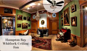 Indoor bronze ceiling fan with light kit. Hampton Bay