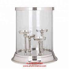 The hurricane can be used as a candle holder or a container to fill with your decor pieces or led. Silver Glass Hurricane 4 T Light Candle Holder Buy Glass Hurricane With Metal Stand Glass Hurricane Candle Holders Large Cheap Glass Hurricane Candle Holders Product On Alibaba Com