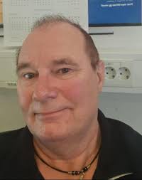 Why does my SBC 383 engine with a mini blower backfire through the  carburetor after warming up?