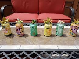 Succulents In Beer Cans Beer Garden Ideas Succulent Planter Diy Succulent Planter