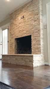Furniture Awesome High Granite Stone Fireplace Big Box Above Laminate Wood Flooring Around Cream P Stone Fireplace Designs Fireplace Remodel Fireplace Makeover