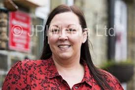 39479458-Healey Junior Infant and Nursery School, Batley rate good by  Ofsted. Headteacher Luisa Lang with students from throughout the school.