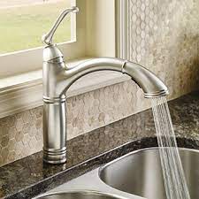 White kitchen sink faucet with tall necklace stand. How To Choose Your Kitchen Sink Faucet Riverbend Home