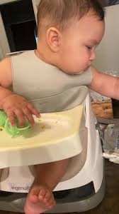 Do you think I might need to get a different chair for him? Every time I  try to get him to eat he seems very distracted. The first days we started  he was eating and actually grabbing the spoon to feed ...