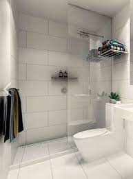 Choosing marble tile for your bathroom wall is gonna be a perfect idea. Small Wall Tiles Can Draw Attention To How Small A Room Is Go For Large Tiles Instead To Create White Subway Tile Bathroom White Bathroom Tiles Small Bathroom