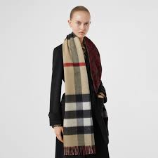 Wherever possible we give surplus fibres new life, weaving small batches of accessories to ensure very little goes to waste. Reversible Check And Monogram Cashmere Scarf In Bright Red Burberry