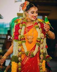 Traditional Tamil Iyengar Hairstyles Aka Andal Kondai We Spotted Brides In In 2021 Bridal Hairstyle Indian Wedding South Indian Bride Saree Indian Wedding Wear