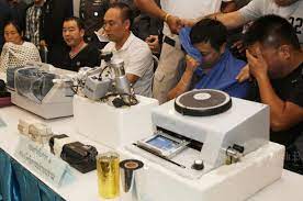 Creating a cloned credit card. Five Chinese Held For Fake Credit Card Ring