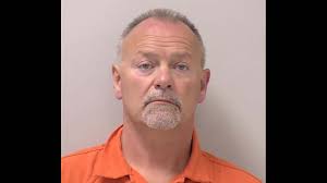 Man charged with murder in crash that killed baby