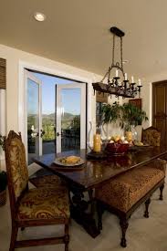 Curved flower glass centerpiece on a cherrywood dining table. Centerpieces Traditional Dining Photos Houzz