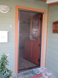 dutch door pull down stowaway retractable screen the screen has 2 stopping points as requested by t retractable screen door screen door front door with screen