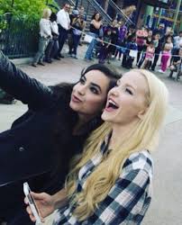 She was watching tv when a ring on her doorbell disturbed her. Sofia Carson Dove Cameron Dove Cameron Sofia Carson Sophia Carson