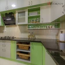 In Light Pista Green And White Glossy Modular Combo This Kitchen Serves All Its Purpose In 2020 Kitchen Kitchen Cabinets Home Decor
