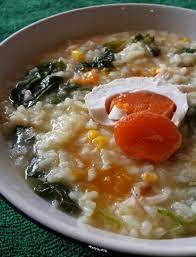 Bubur Khas Manado Beras Putih Yang Dimasak Dengan Ubi Labu Bayam Daun Kemangi Jagung Serai Rempah Rempah Lainnya Dipadukan Dengan Telur Ubi Labu Bayam