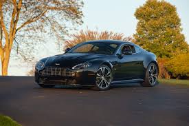 Image result for Carbon Black 2011 Aston Martin