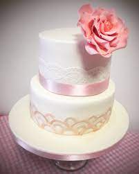 Wedding Cake 2 Tier Cake In White Fondant With Gold Art Deco Details Lace And A Large Pink Sugar Rose Tiered Cakes Cake Amazing Cakes