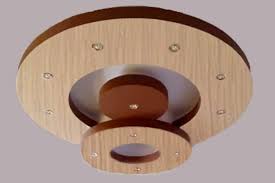 The design of the false ceiling, and how elaborate and decorative it is; Best Wooden Ceiling Manufacturer Kolkata Furniture