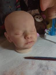 Dyeing a doll's hair to red. Any ideas?