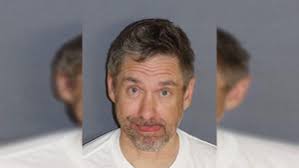 Ely man charged after shooting at girlfriend, fleeing police