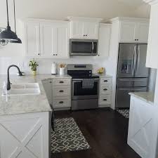 question where to buy kitchen rugs? White Kitchen Subway Tile Wood Floors Farmhouse Fixer Upper Target Rugs Farmhouse Style Kitchen Cabinets Modern Farmhouse Kitchens Kitchen Cabinet Styles