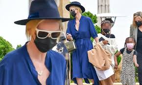 She was raised on a farm outside the city. Charlize Theron Puts On A Stylish Display In A Blue Dress As She Enjoys Lunch With Her Kids At Nobu Daily Mail Online