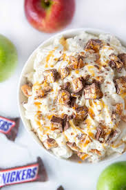 In the bowl of an electric mixer, beat the cream cheese until smooth. Easy Apple Snickers Salad Design Eat Repeat