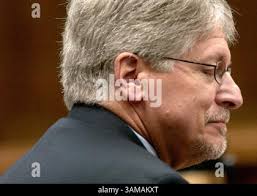 Former Durham district attorney Mike Nifong is sworn in as he takes the  witness stand in his own defense after pleading not guilty to a criminal  contempt of court charge in front