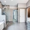 The marble tile floor follows the pattern of the tub and provides a consistency to the room in a striking way. 1