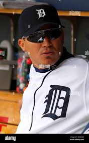 Detroit Tigers' Magglio Ordonez (30) welcomes Gerald Laird after they both  scored