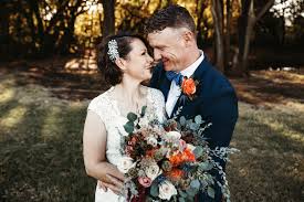 Profile wedding photography poses can help you to capture the magic of the ocean and beautiful veil and dress of the bride flying in the wind. Kara Cheek Photography Oklahoma Wedding Engagement And Family Photographer