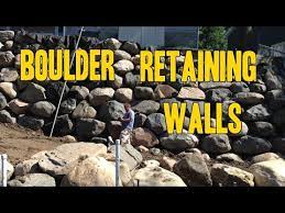 How To Build A Boulder Retaining Wall - Youtube